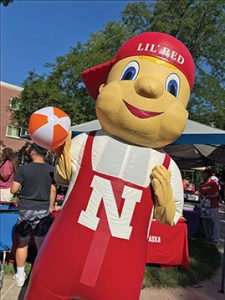 a mascot has a good time at a tailgate party