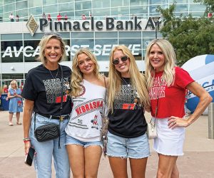 Four women outside the Pinnacle Bank Arena in Lincoln, Nebraska