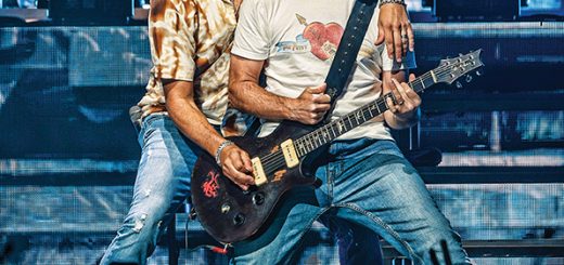 Guitarists on stage at Pinnacle Bank Arena