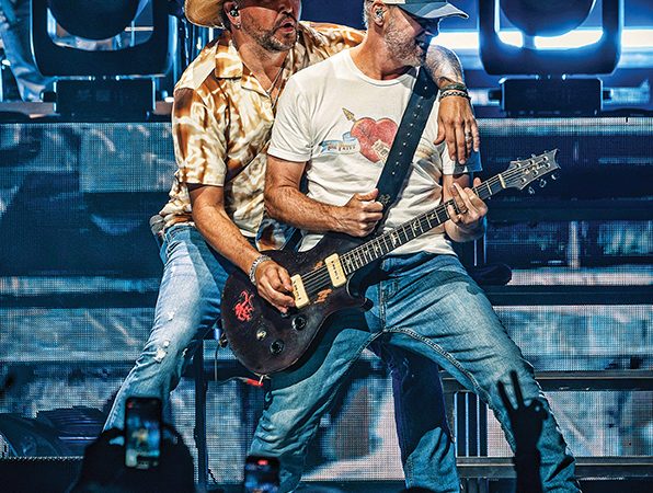 Guitarists on stage at Pinnacle Bank Arena