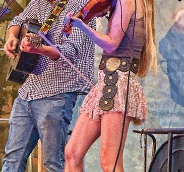 musicians on stage in Lincoln, Nebraska